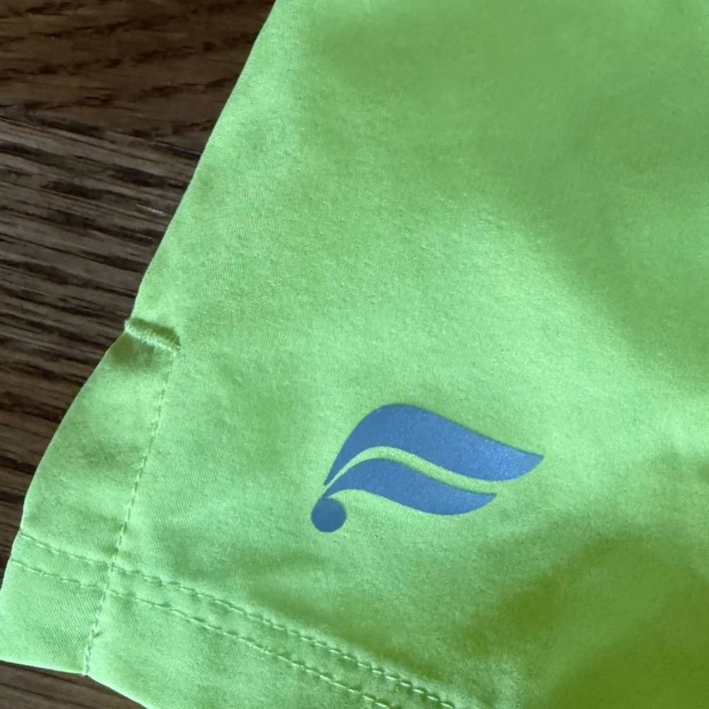 Fabletics. 7 inch Universal Tennis Fundamental Short. Highlighter Yellow. XS